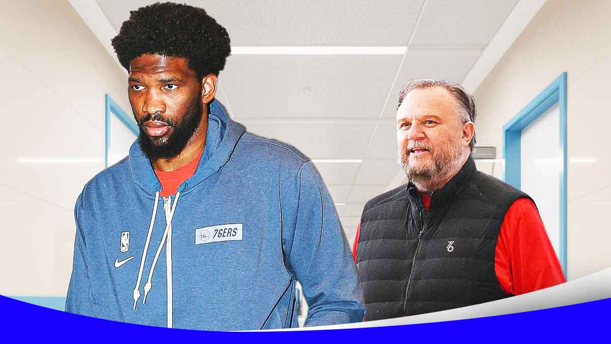 Daryl Morey looking at 76ers' Joel Embiid in casual clothes, with hospital background