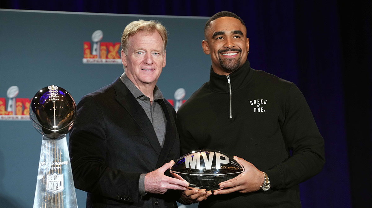 NFL commissioner Roger Goodell (left) and Philadelphia Eagles quarterback Jalen Hurts (right) pose with the Vince Lombardi trophy at the Super Bowl LIX Winning Head Coach and Most Valuable Player press conference at the Ernest N. Morial Convention Center.