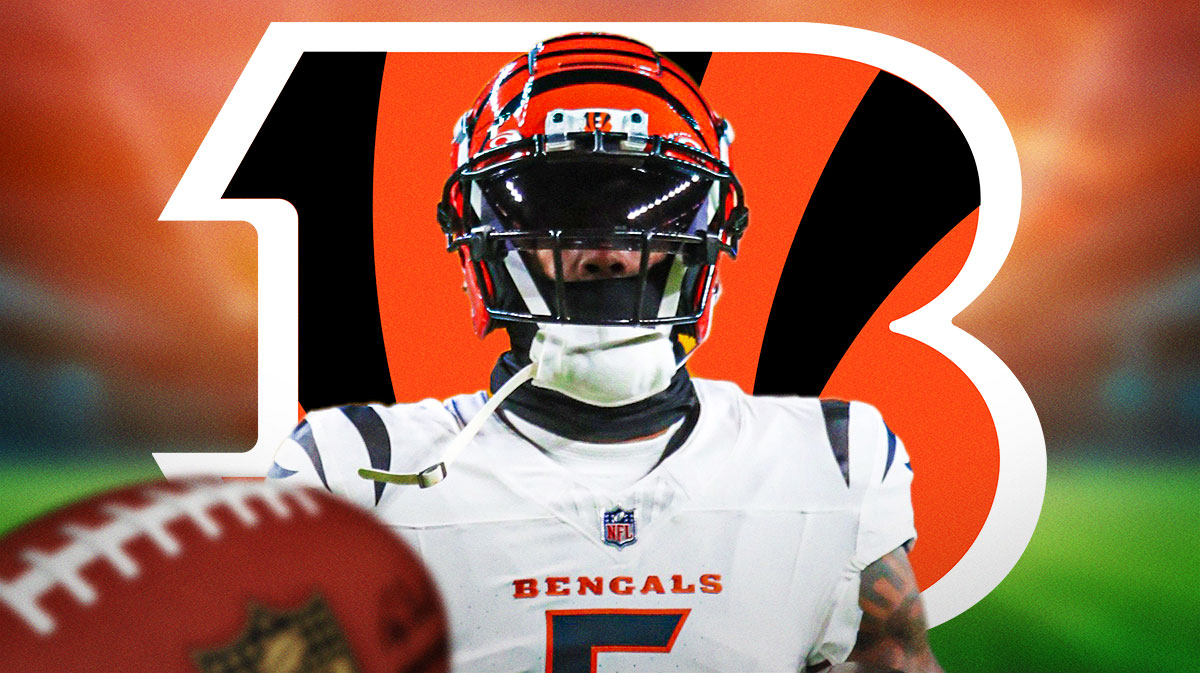 Bengals' Tee Higgins with Bengals logo behind him