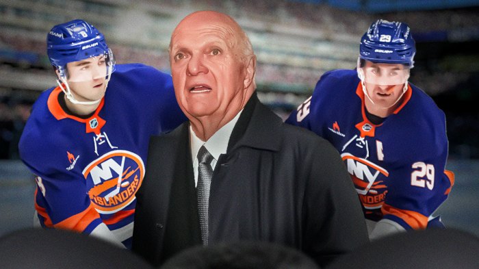 Lou Lamoriello front and center. Brock Nelson behind to right. Noah Dobson behind to left