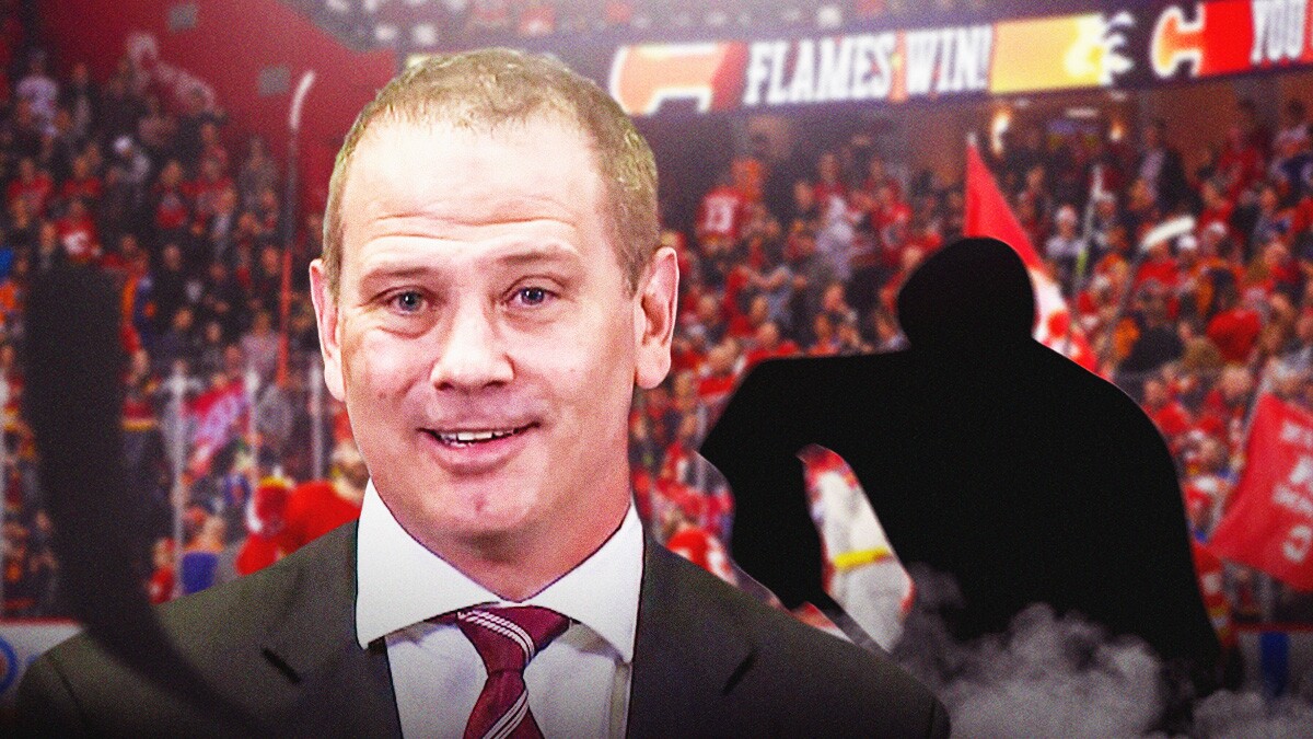 Flames GM Craig Conroy on the left, a blank silhouette of a player on the right, inside the Saddledome