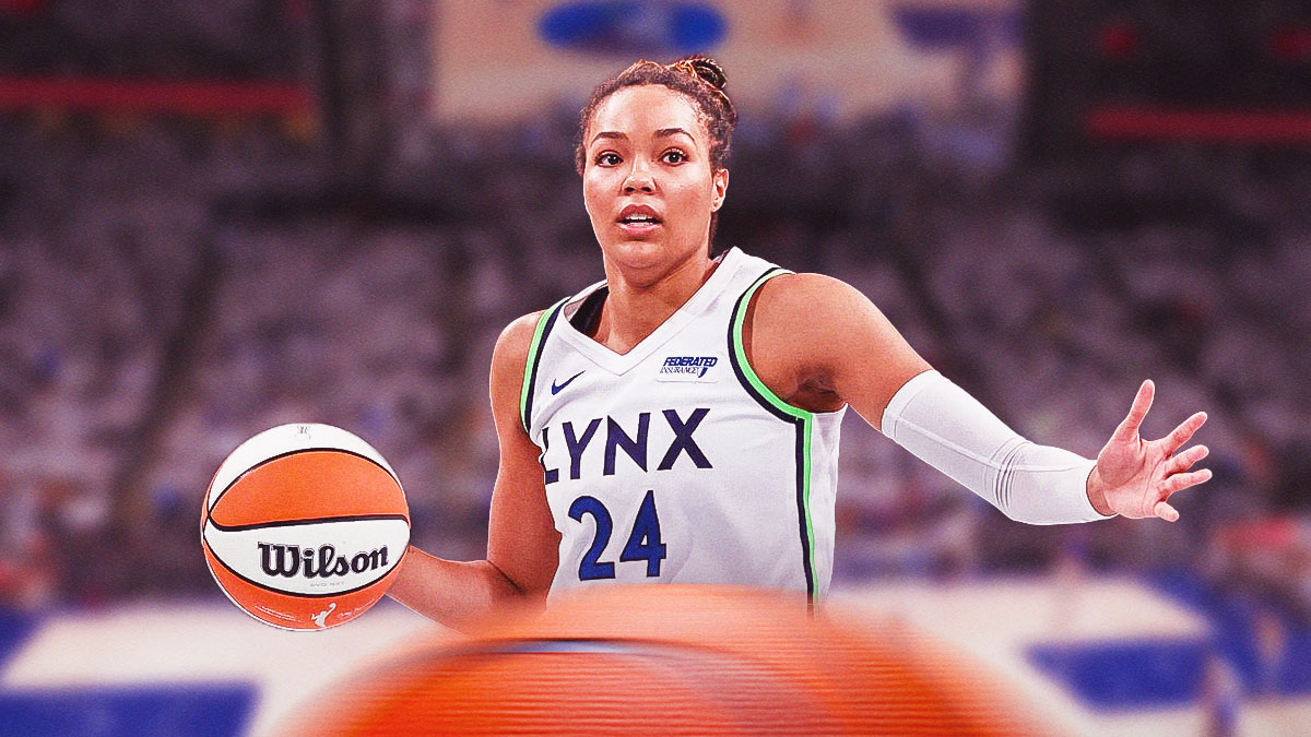 Minnesota Lynx WNBA player Napheesa Collier in a Lynx uniform while playing basketball