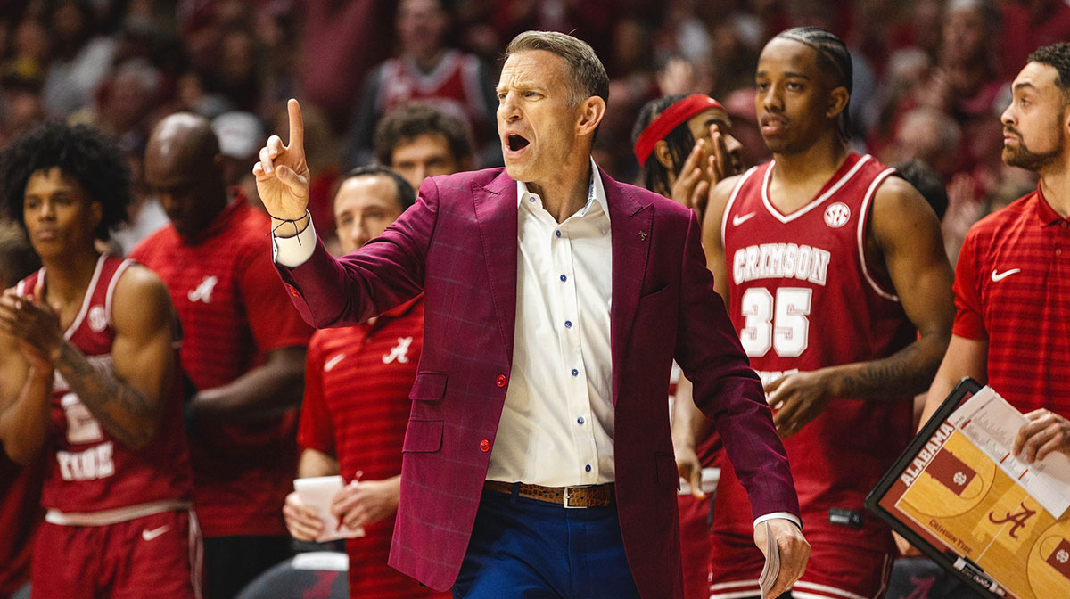 Alabama Crimson Tide head coach Nate Oats directs his team against the Auburn Tigers during the first half at Coleman Coliseum.