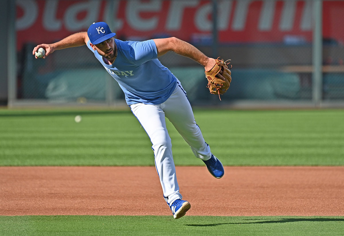 Kansas City Royals third baseman Paul DeJong (15) takes fielding practice before a game against the Detroit Tigers at Kauffman Stadium.