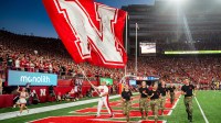 A Nebraska Cornhuskers flag is waved after a touchdown against the Illinois Fighting Illini during the first quarter at Memorial Stadium.
