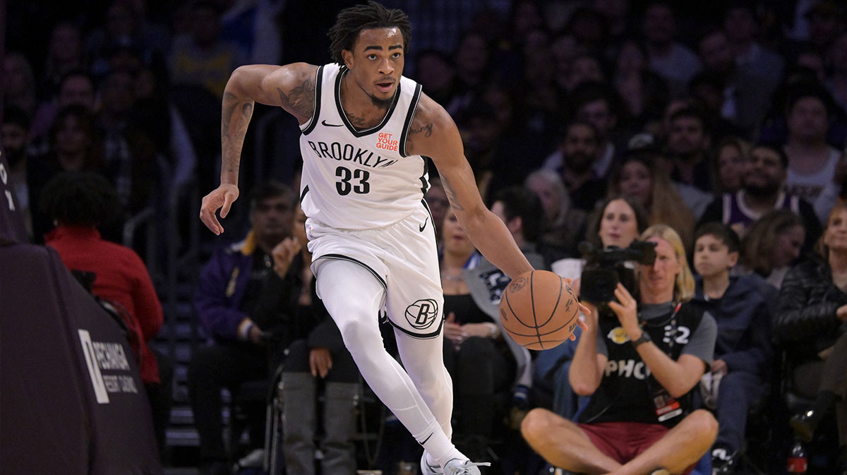 Brooklyn Nets Center NIC Claxton (33) handles the ball against Los Angeles Lakers at the Cripto.com Arena.