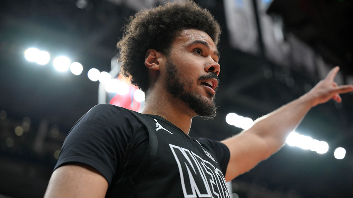 The Network forwarded Kam Johnson (2) reacts after the basket and earned a violation against Toronto Raptor in the first half in Scotiabank Arena