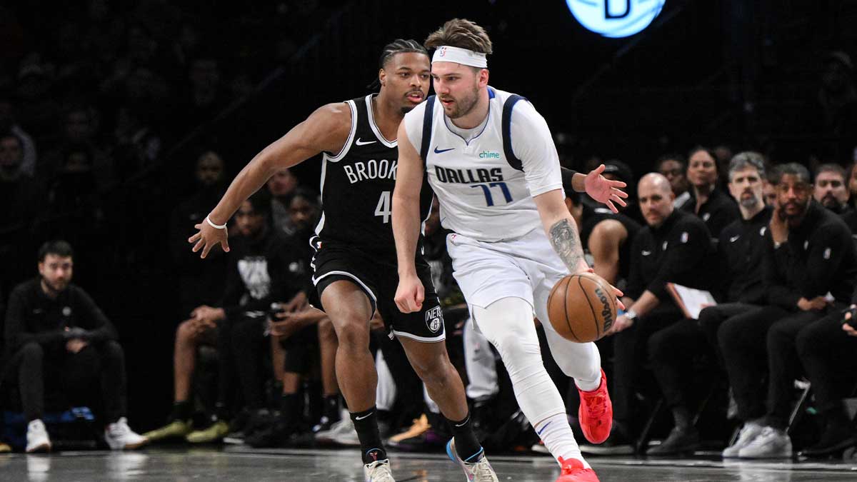 Nets guard Dennis Smith Jr. defends Luka Doncic