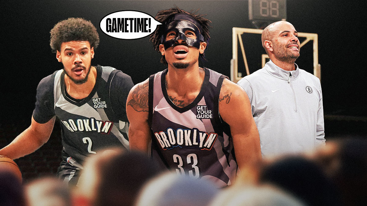 Nic Claxton saying 'Gametime!' with Cam Johnson and Jordi Fernandez on the other side
