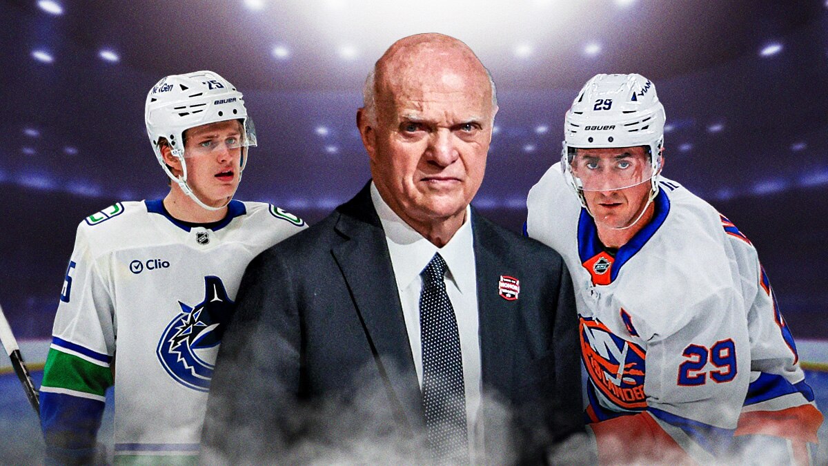 Lou Lamoriello front and center. Brock Nelson behind to right. Elias Pettersson behind to left