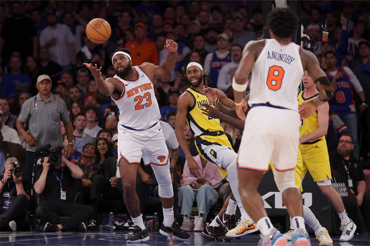 New York Knicks center Mitchell Robinson (23) grabs a rebound against Indiana Pacers forward Isaiah Jackson (22) during the fourth quarter of game one of the second round of the 2024 NBA playoffs at Madison Square Garden