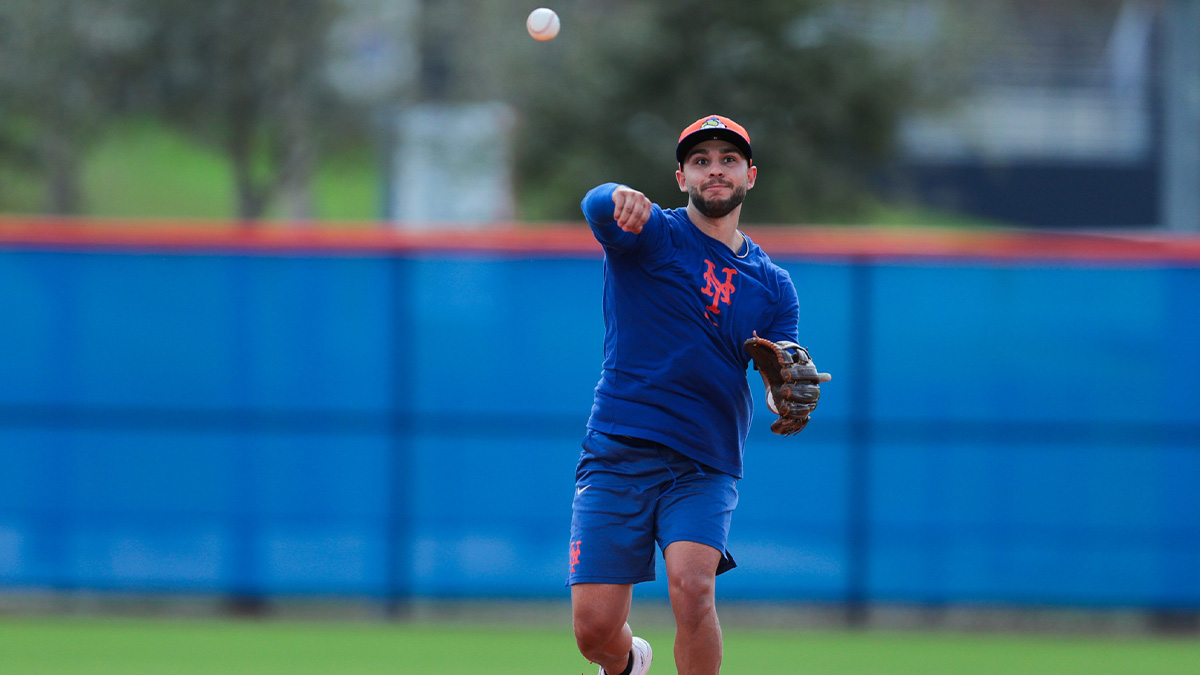 New York Mets infielder Nick Madrigal (11) throws the baseball during Spring Training workouts at Clover Park