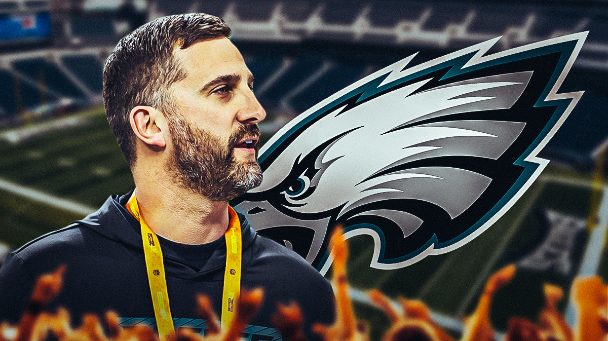 Nick Sirianni looking excited next to an Eagles logo