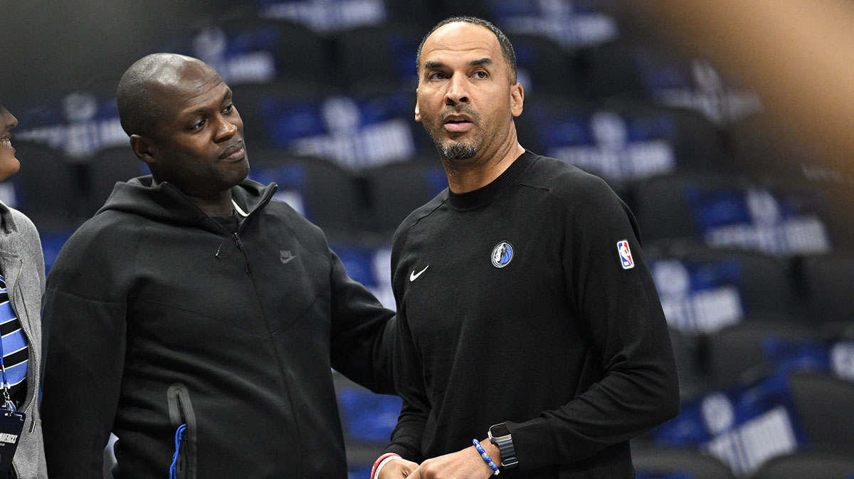 Dallas Mavericks general manager Nico Harrison (right) looks on during warms up before the game between the Dallas Mavericks and the Memphis Grizzlies at the American Airlines Center.