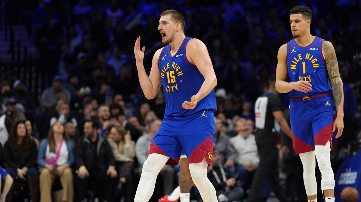 Denver Nuggets Center Nikola Jokić (15) reacts against Filadelphia 76ers in the fourth quarter in the Vells Fargo Center.