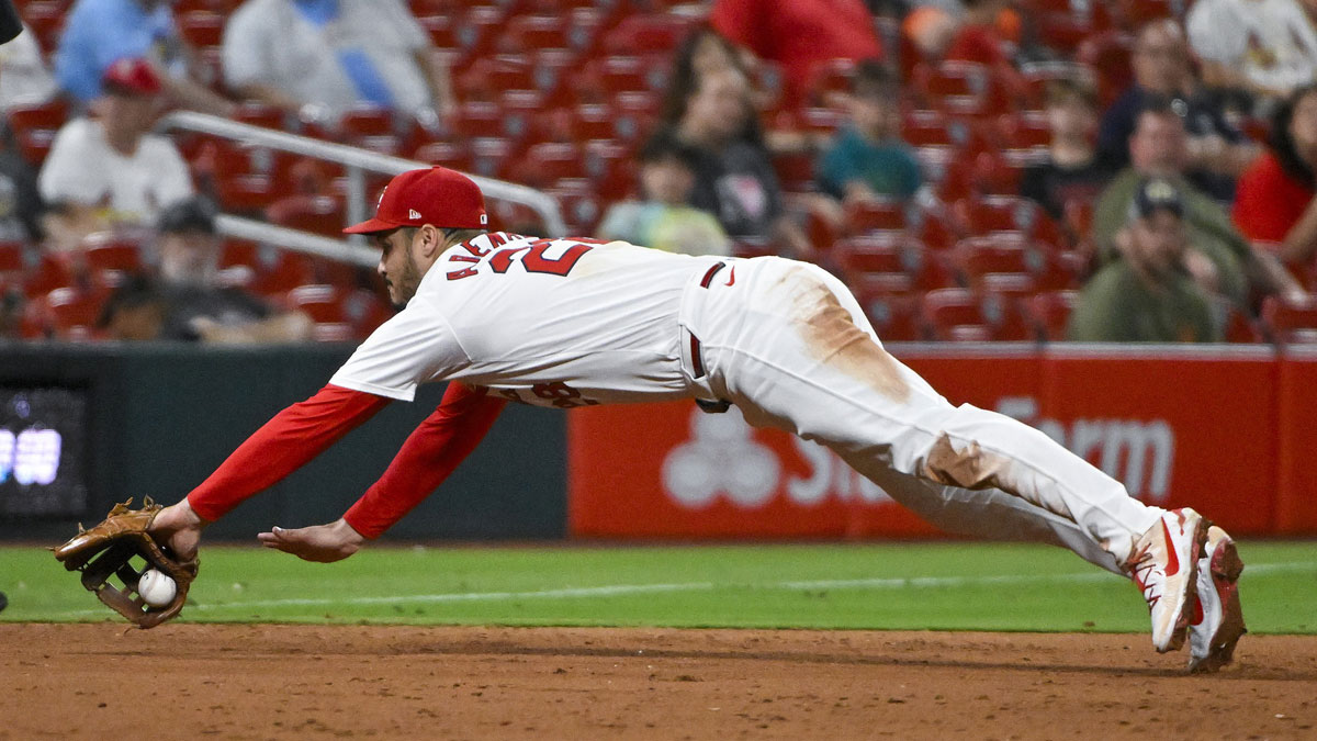 Sep 18, 2024; St. Louis, Missouri, USA; St. Louis Cardinals third baseman Nolan Arenado (28) dives but is unable to field a ground ball hit by Pittsburgh Pirates center fielder Billy Cook (not pictured) during the ninth inning at Busch Stadium. 