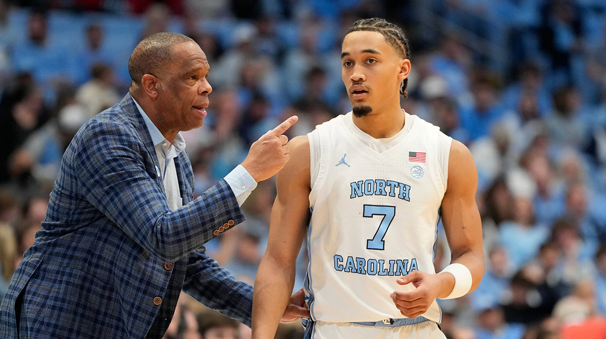 North Carolina Tar Heels head coach Hubert Davis talks to guard Seth Trimble (7) in the first half at Dean E. Smith Center.