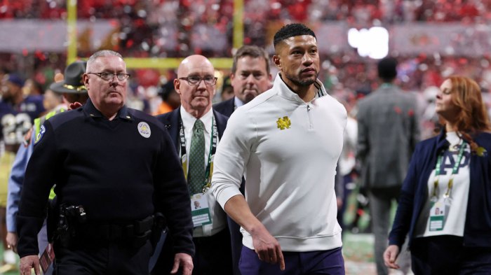 Notre Dame Fighting Irish head coach Marcus Freeman reacts after losing against the Ohio State Buckeyes in the CFP National Championship college football game at Mercedes-Benz Stadium.