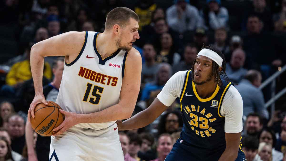 Nuggets center Nikola Jokic holds ball