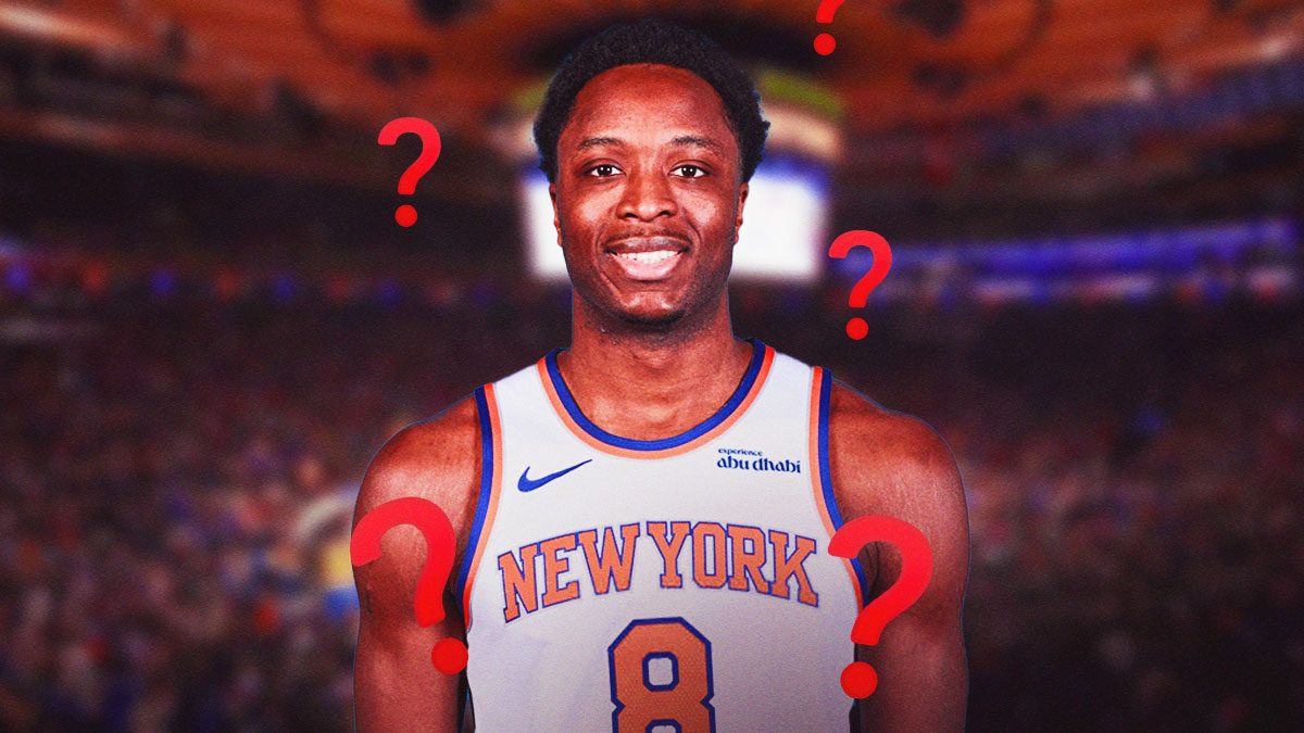 Knicks' OG Anunoby smiling with question marks all over him