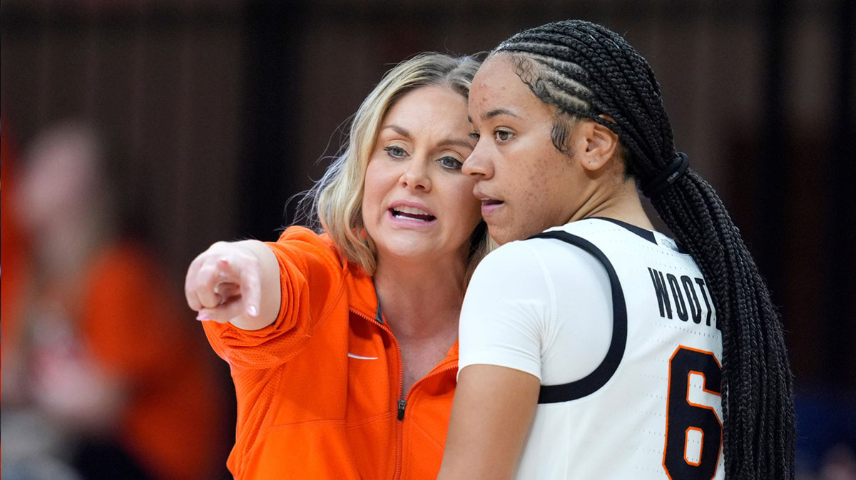 Oklahoma State coach Jacie Hoyt talks with guard Jadyn Wooten (6) during a women's college basketball game between the Oklahoma State Cowgirls (OSU) and the Arizona State Sun Devils.