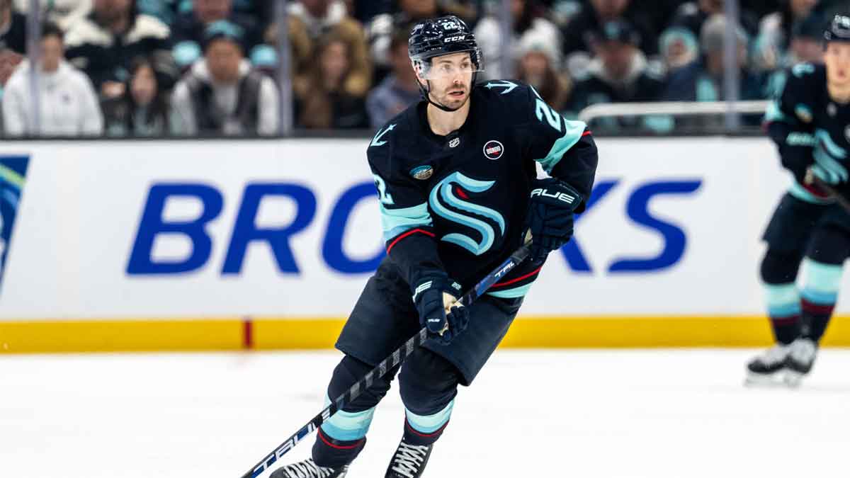 Seattle Kraken forward Oliver Bjorkstrand (22) skates with the puck against the Los Angeles Kings at Climate Pledge Arena.