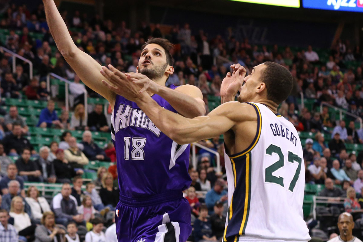 Sacramento Kings Forward Omri Caspi (18) Shooting the ball as Utah Jazz Center Rudi Goberta (27) is prohibited during the first quarter of Arena energitions Arena.