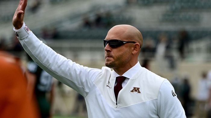 Minnesota Golden Gophers head coach PJ Fleck waves to fans at Spartan Stadium before playing MSU.