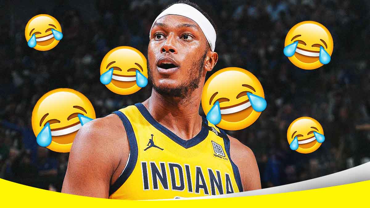 Image of Pacers center Myles Turner smiling with laughing emoji next to him.