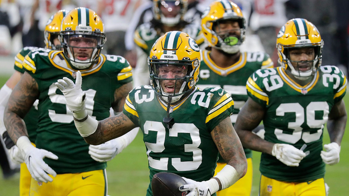 Green Bay Packers cornerback Jaire Alexander (23) celebrates a fourth quarter interception against the Tampa Bay Buccaneers during the NFC Championship game.