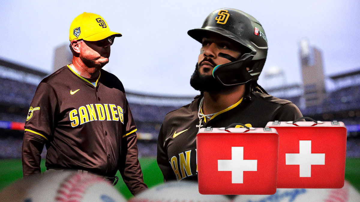 Fernando Tatis Jr with first-aid kits around him, as well as Padres manager Mike Shildt