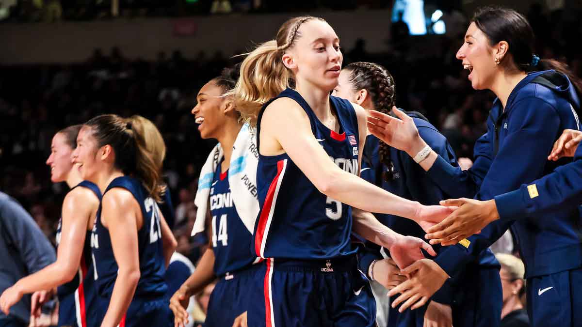 UConn Huskies guard Paige Bueckers (5) is congratulated after being pulled from the game against the South Carolina Gamecocks in the second half at Colonial Life Arena. 