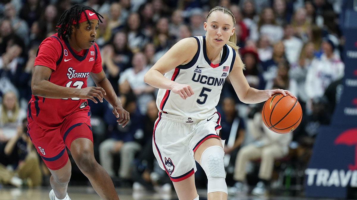 UConn Huskies guard Paige Bueckers (5) returns the ball against St. John's Red Storm guard Lashae Dwyer (13) in the second half at Harry A. Gampel Pavilion.