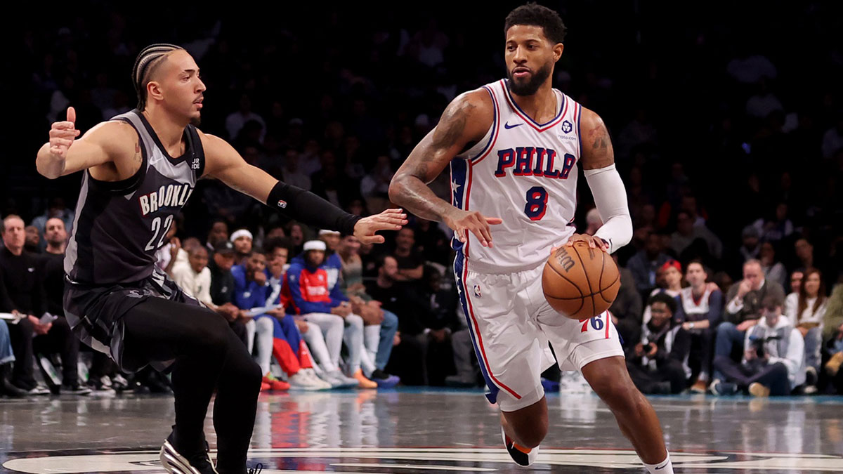 12. February 2025; Brooklyn, New York, USA; PHILADELPHIA 76ers The front Paul George (8) brings a ball against Brooklyn networks forward Jalen Wilson (22) during the fourth quarter in the center of Barclays.