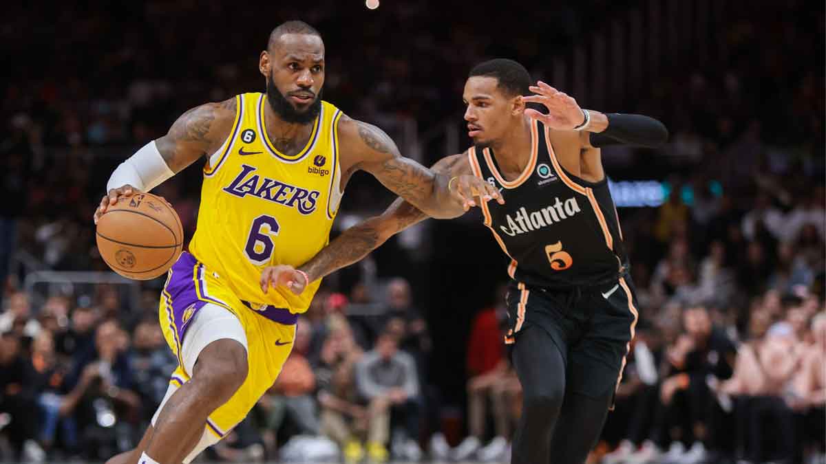 Los Angeles Lebron James (6) Defend Atlanta Hawks Guard Dejounte Murrai (5) in the second half at the State Farm Arena. 