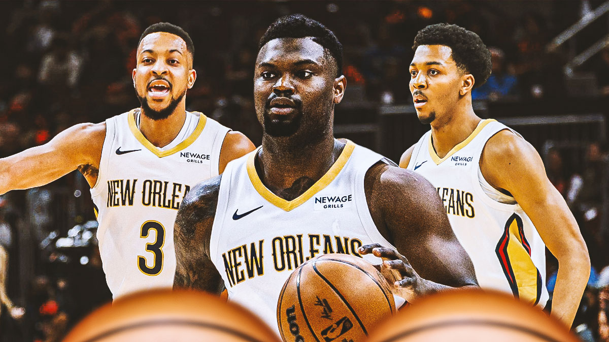 Pelicans Zion Williamson after a triple-double (front, center) with Pelicans CJ McCollum (back left) and Pelicans Trey Murphy III (back right)