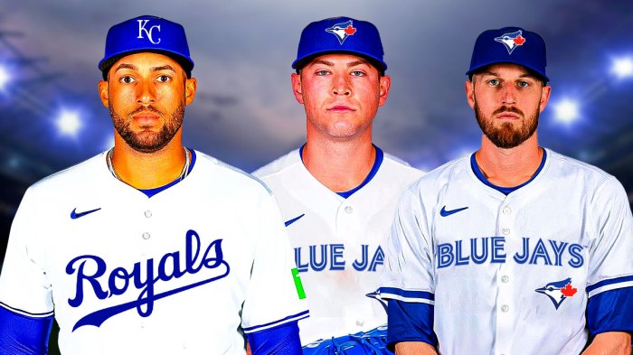 George Springer in a Royals uniform standing next to Kris Bubic (in a Blue Jays uniform) and Chris Stratton (in a Blue Jays uniform)