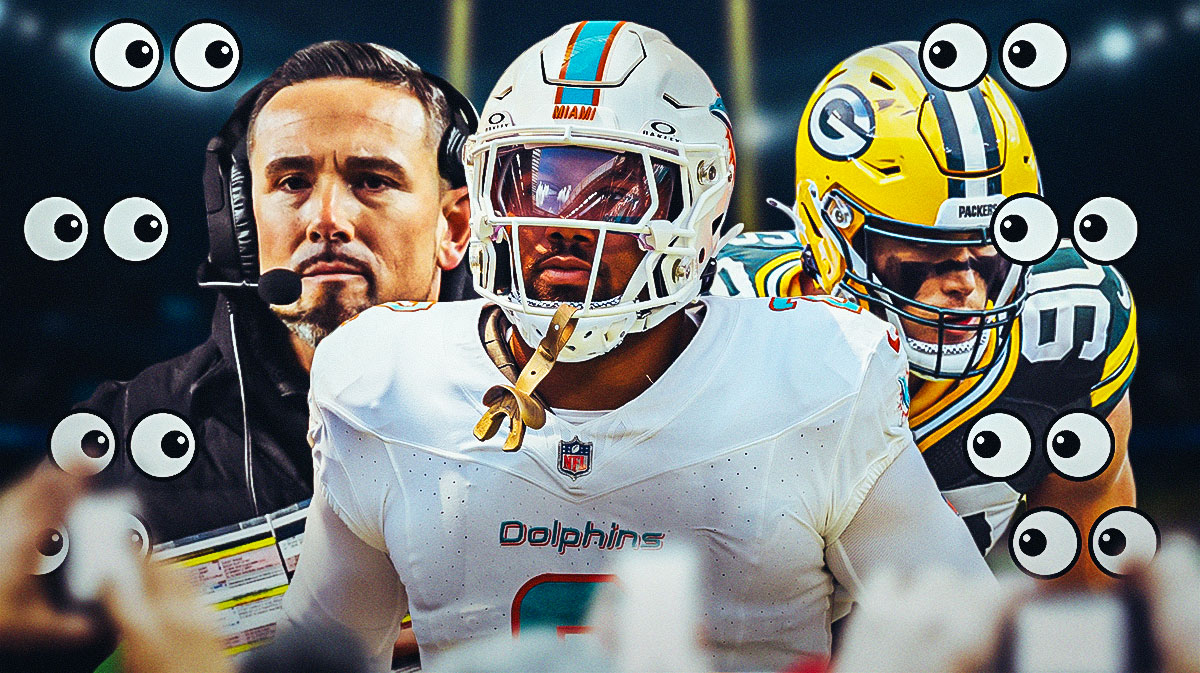 Bradley Chubb in the middle, Coach Matt LaFleur and Lukas Van Ness beside him, 👀 👀 👀 in the background