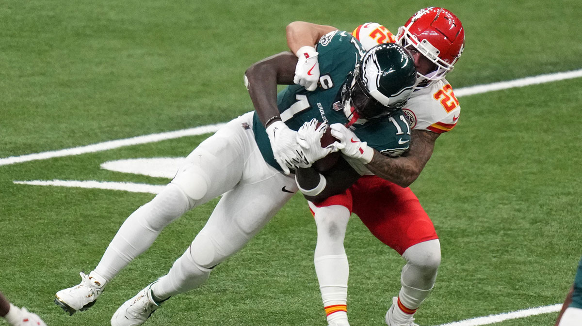 Philadelphia Eagles wide receiver A.J. Brown (11) makes a catch against Kansas City Chiefs cornerback Trent McDuffie (22) during the fourth quarter in Super Bowl LIX at Caesars Superdome.