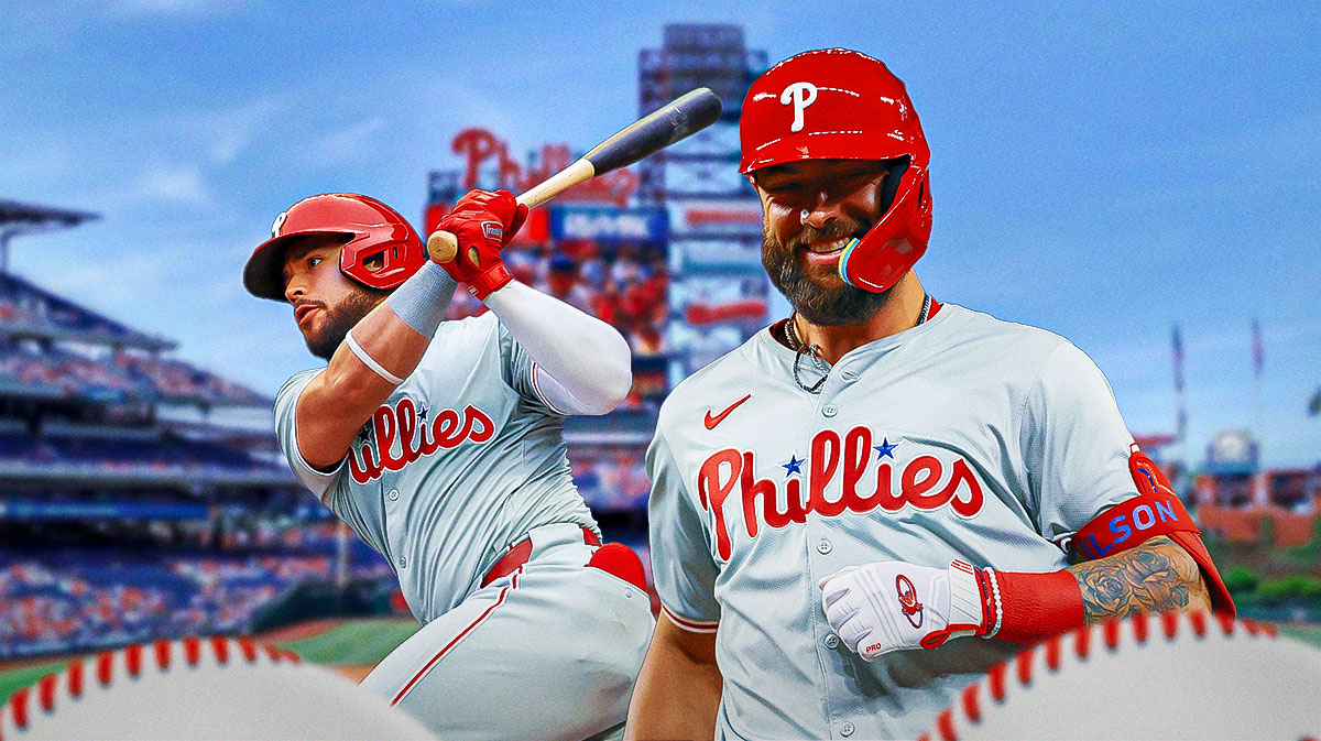 Weston Wilson and Rafael Marchan smile in Phillies jerseys