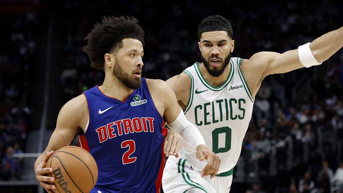 Pistons guard Cade Cunningham (2) dribbles vs. Celtics' Jayson Tatum