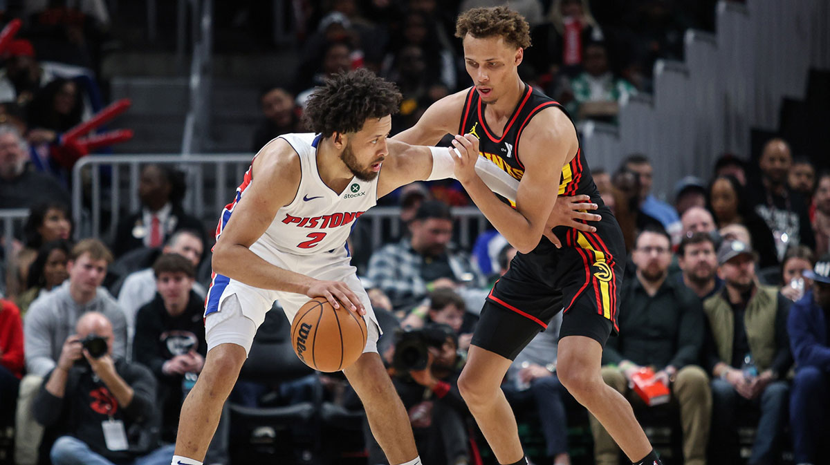 Pistons guard Cade Cunningham (2) protects the ball 