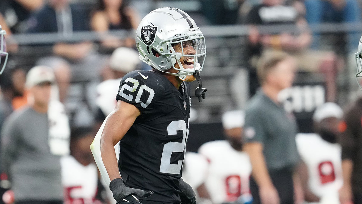 Las Vegas Raiders safety Isaiah Pola-Mao (20) celebrates after getting a sack against the Cleveland Browns during the third quarter at Allegiant Stadium.