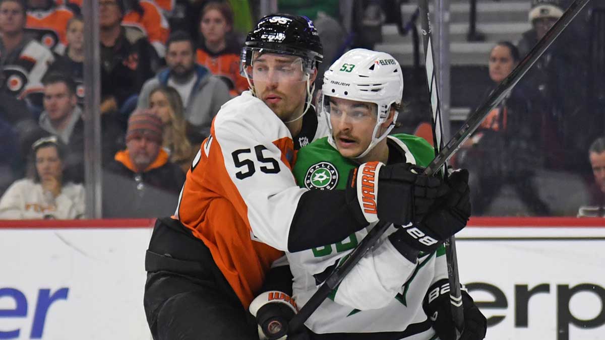 Jan 9, 2025; Philadelphia, Pennsylvania, USA; Philadelphia Flyers defenseman Rasmus Ristolainen (55) and Dallas Stars center Wyatt Johnston (53) battle for position during the second period at Wells Fargo Center.