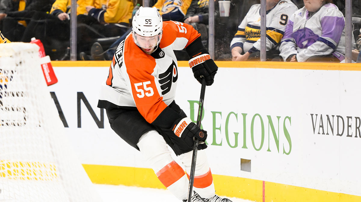 Philadelphia Flyers defenseman Rasmus Ristolainen (55) skates with the puck against New Jersey Devils right wing Nathan Bastian (14) during the third period at Prudential Center. 