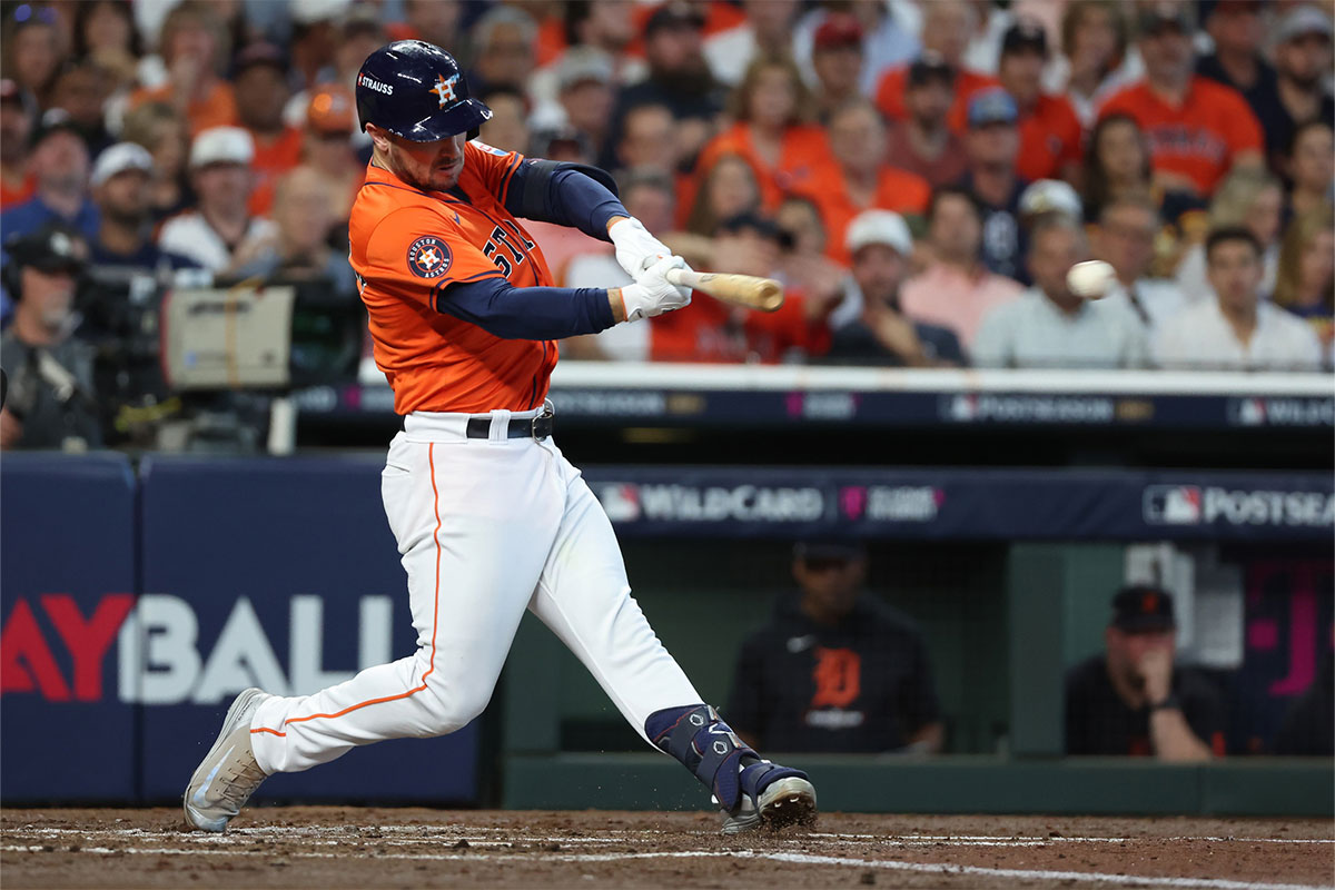 Houston Astros third base Alex Bregman (2) hits a single against the Detroit Tigers during the second inning of game two of the Wildcard round for the 2024 MLB Playoffs at Minute Maid Park.