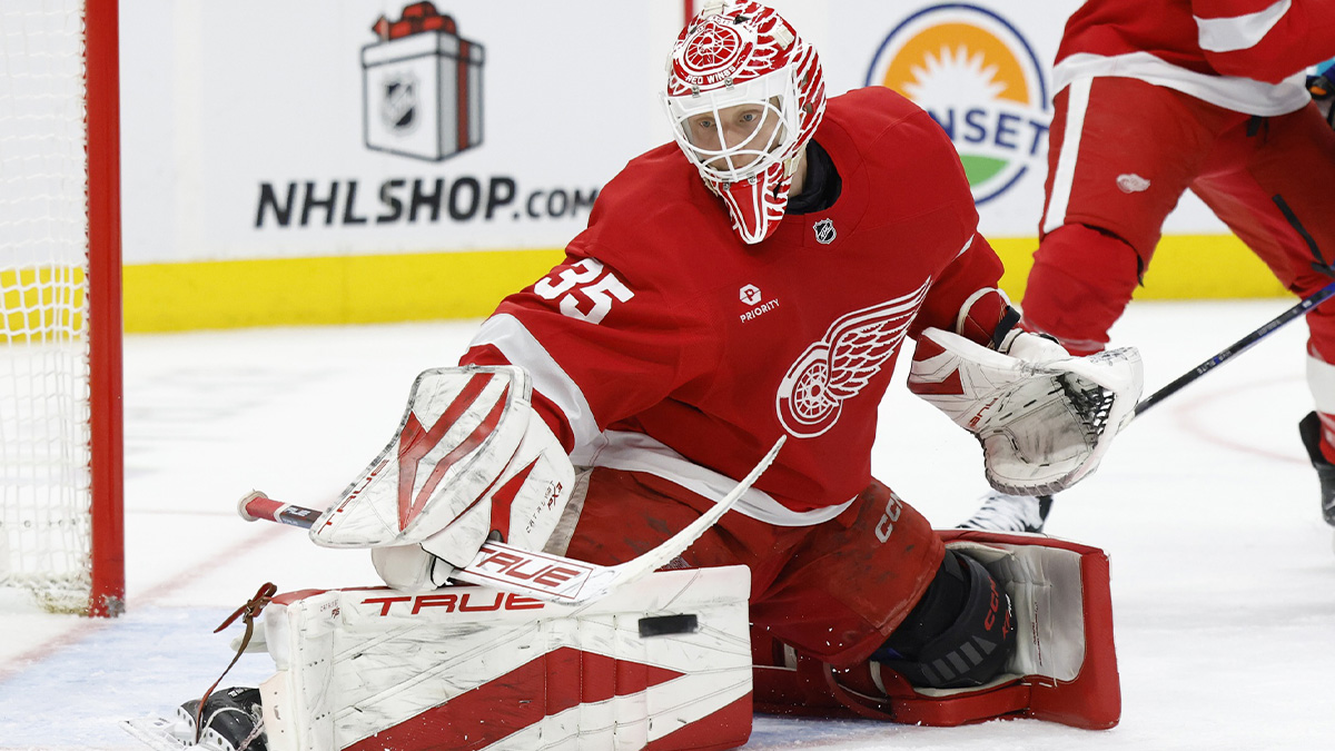 Detroit Red Wings goaltender Ville Husso (35) makes a save in the third period against the Vancouver Canucks at Little Caesars Arena.