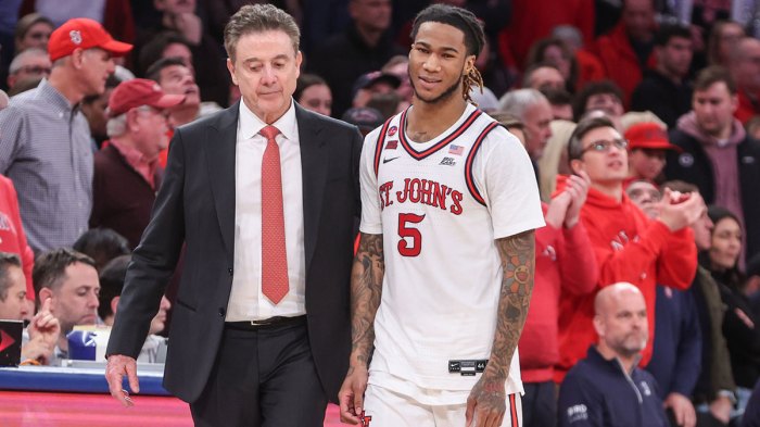 Feb 16, 2025; Queens, New York, USA; St. John's Red Storm guard Deivon Smith (5) walks to the bench with head coach Rick Pitino in the second half against the Creighton Bluejays at Madison Square Garden. Mandatory Credit: Wendell Cruz-Imagn Images