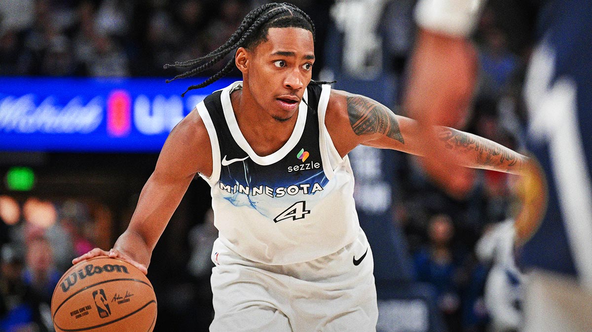 Minnesota Timberwolves guard Rob Dillingham (4) controls the ball against the Denver Nuggets during the fourth quarter at Target Center. 