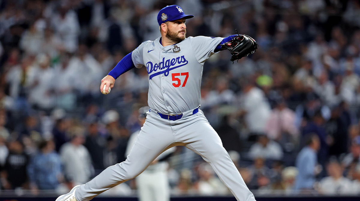 Los Angeles Dodgers pitcher Ryan Brasier (57) pitches during the third inning against the New York Yankees in game four of the 2024 MLB World Series at Yankee Stadium.